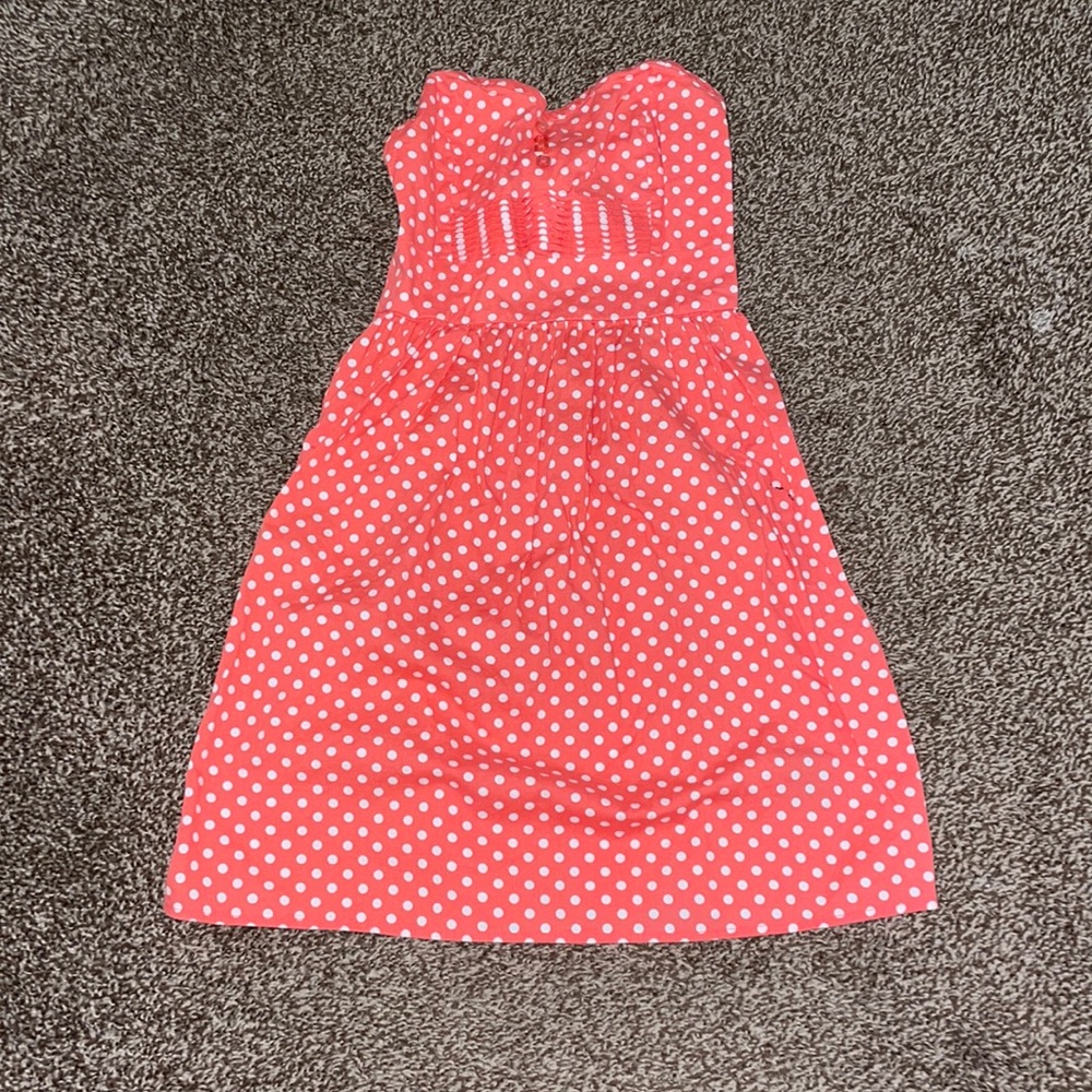 Strapless pink dress with white polka dots